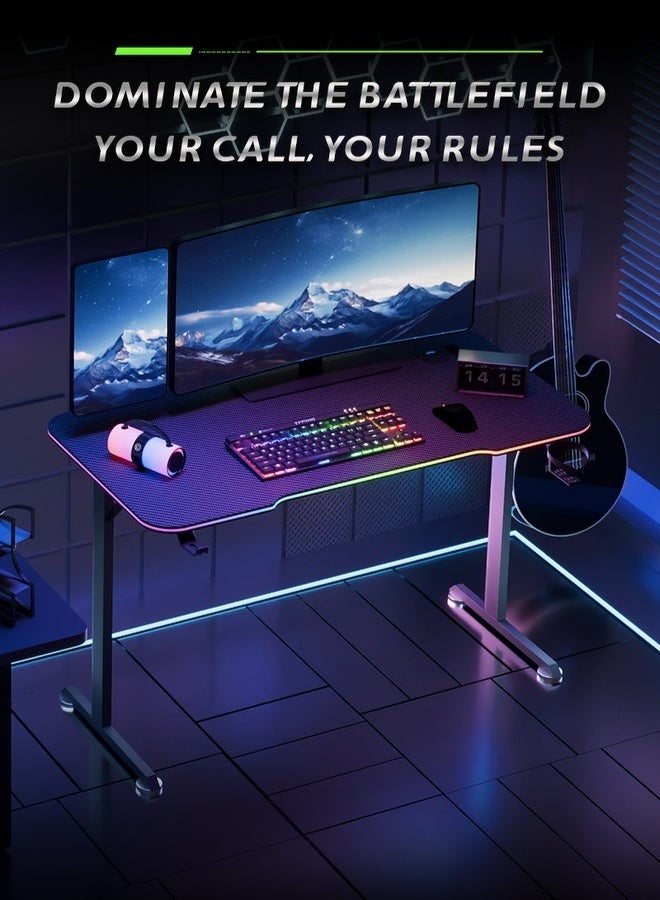 AOR Esports مكتب ألعاب مزود بإضاءة RGB على وحدة التحكم المكتبية، خطافات للسماعات، حامل أكواب وصندوق مقبس، مصنوع من ألياف الكربون، حجم سطح المكتب L120 * W60 سم، ارتفاع 73 سم، مكتب كمبيوتر أسود - Image 1